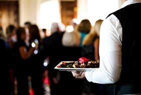 Closeup-Shot-Of-A-Waiter-S-Arm-Carrying-A-Plate-Of-2023-11-27-05-29-59-Utc