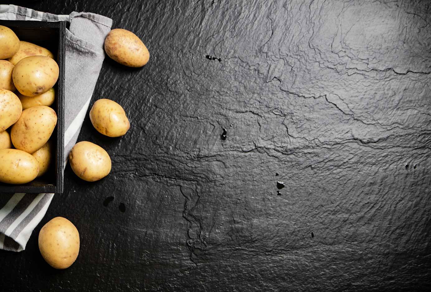 Fresh Potatoes On Black Background 2023 11 27 05 02 24 Utc